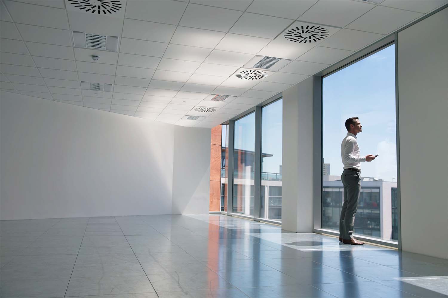 businessman looking out of window office